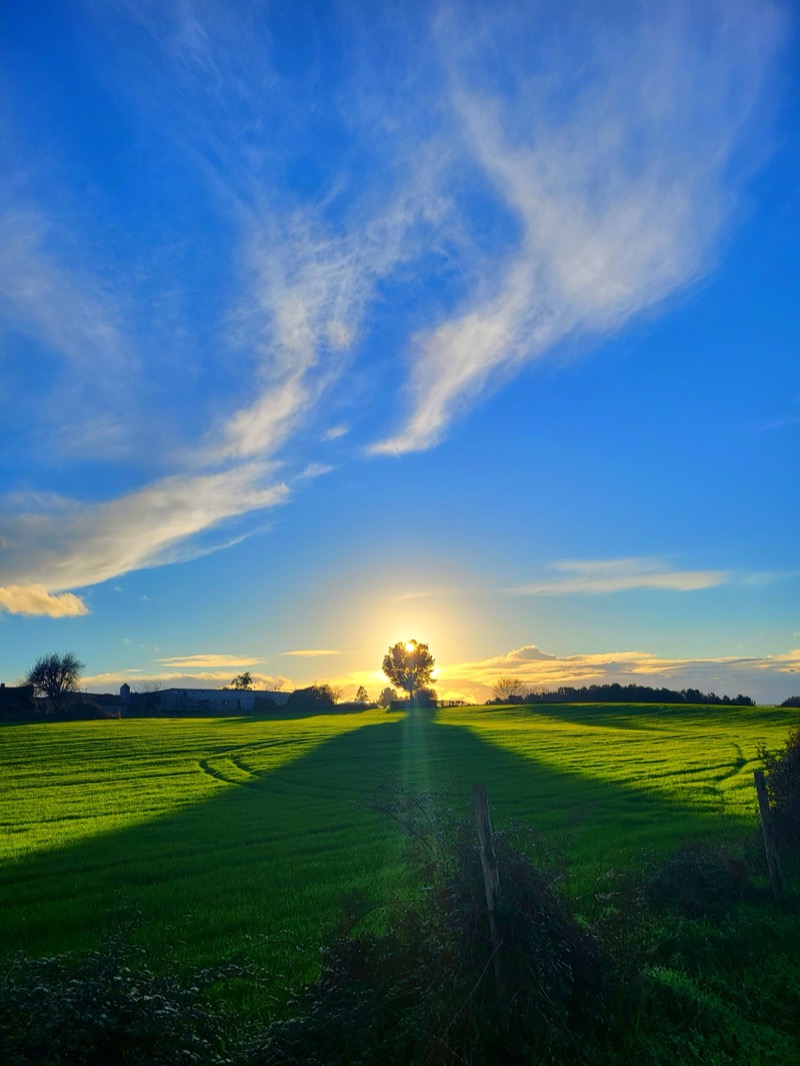 Rural sunset with dramatic clouds