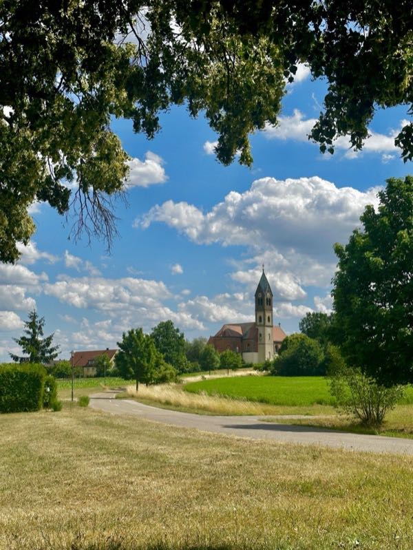 Church with trees and blue sky